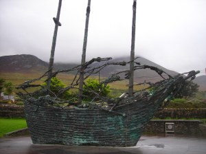 This sculpture is called the Coffin Ship, and it's located near the base of Crough Patrick. It represents the overcrowded ships that the Irish refugees took to America in the 1840's in an attempt to escape the potato famine. Unscrupulous Irishmen sold too many tickets for each ship, and many refugees died during the voyage. 