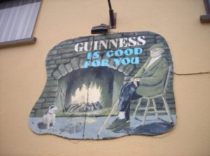 This slogan, and its varients, are on the sides of sevaral pubs. I'm more amused by the severe obesity of that little dog. 