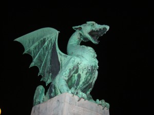 This is one of the four dragons that guard each corner of the Dragon Bridge in Ljubljana. there's an entire dragon theme in Ljubljana. Store names, public art, decorations, even the logo of the local beer (Union) bears a dragon motif.